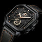 Luxury black watch with gold accents on a black background